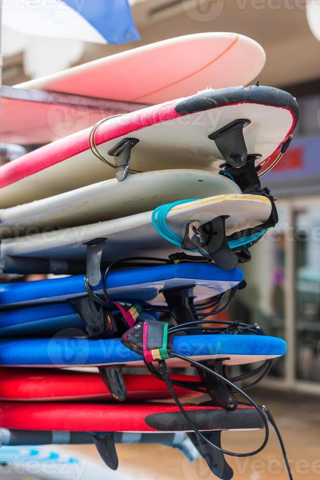 Surf boards in a stack photo