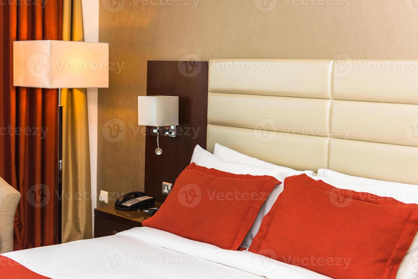 Hotel room with a prepared fresh bed photo