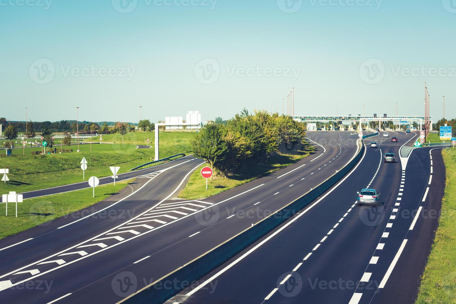 Miltilane highway with a toll payment point photo