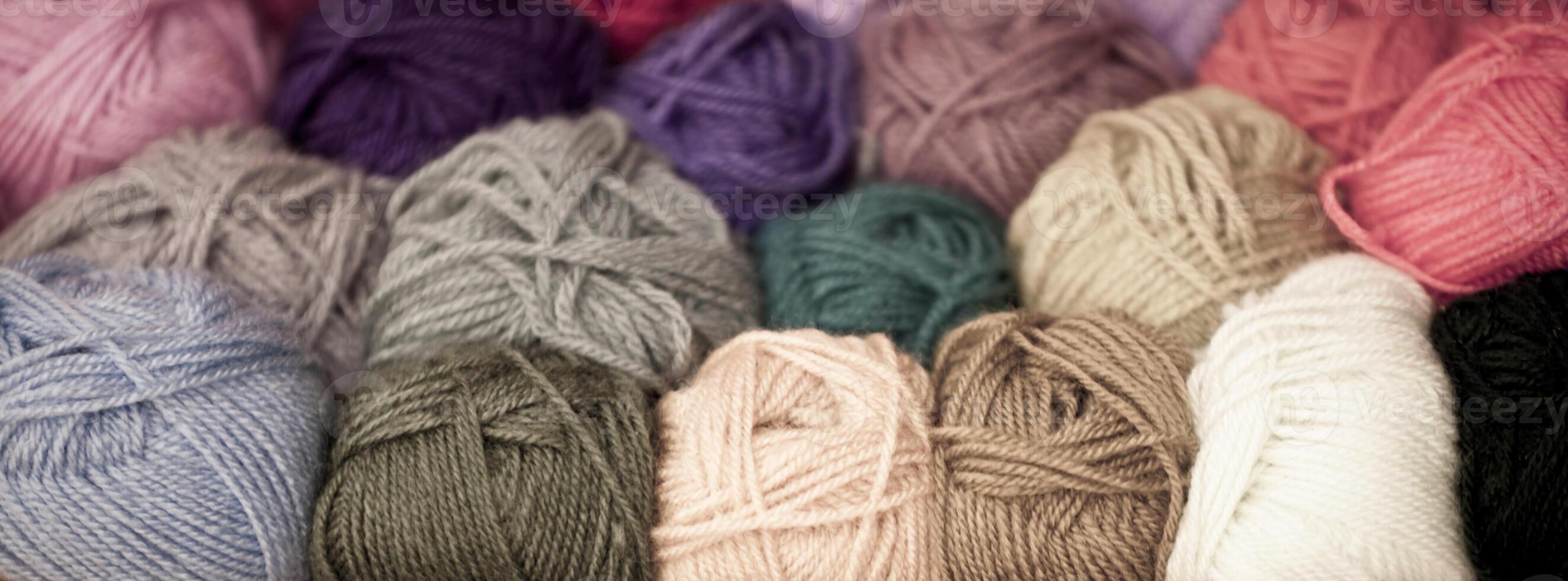 Colorful different wool thread balls photo