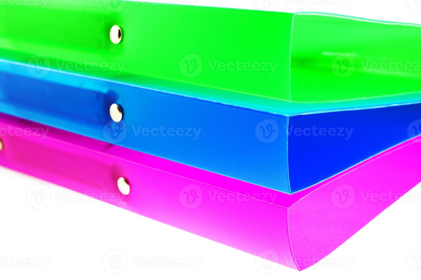 three multicolored folders photo