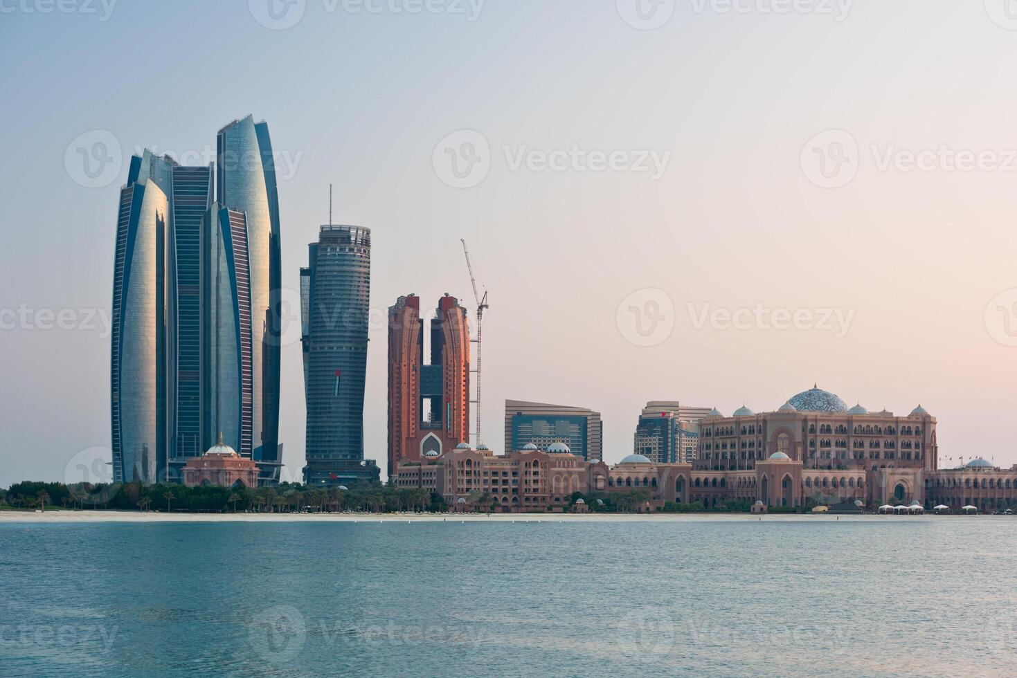Abu Dhabi buildings skyline from the sea photo