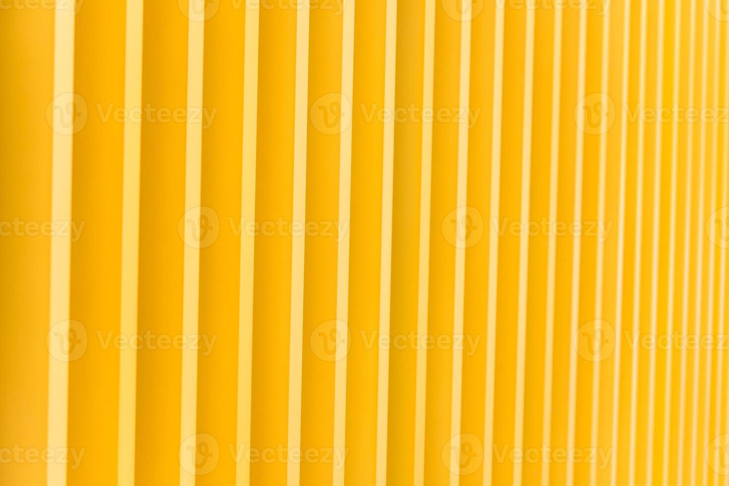 Detail of yellow metal building facade photo
