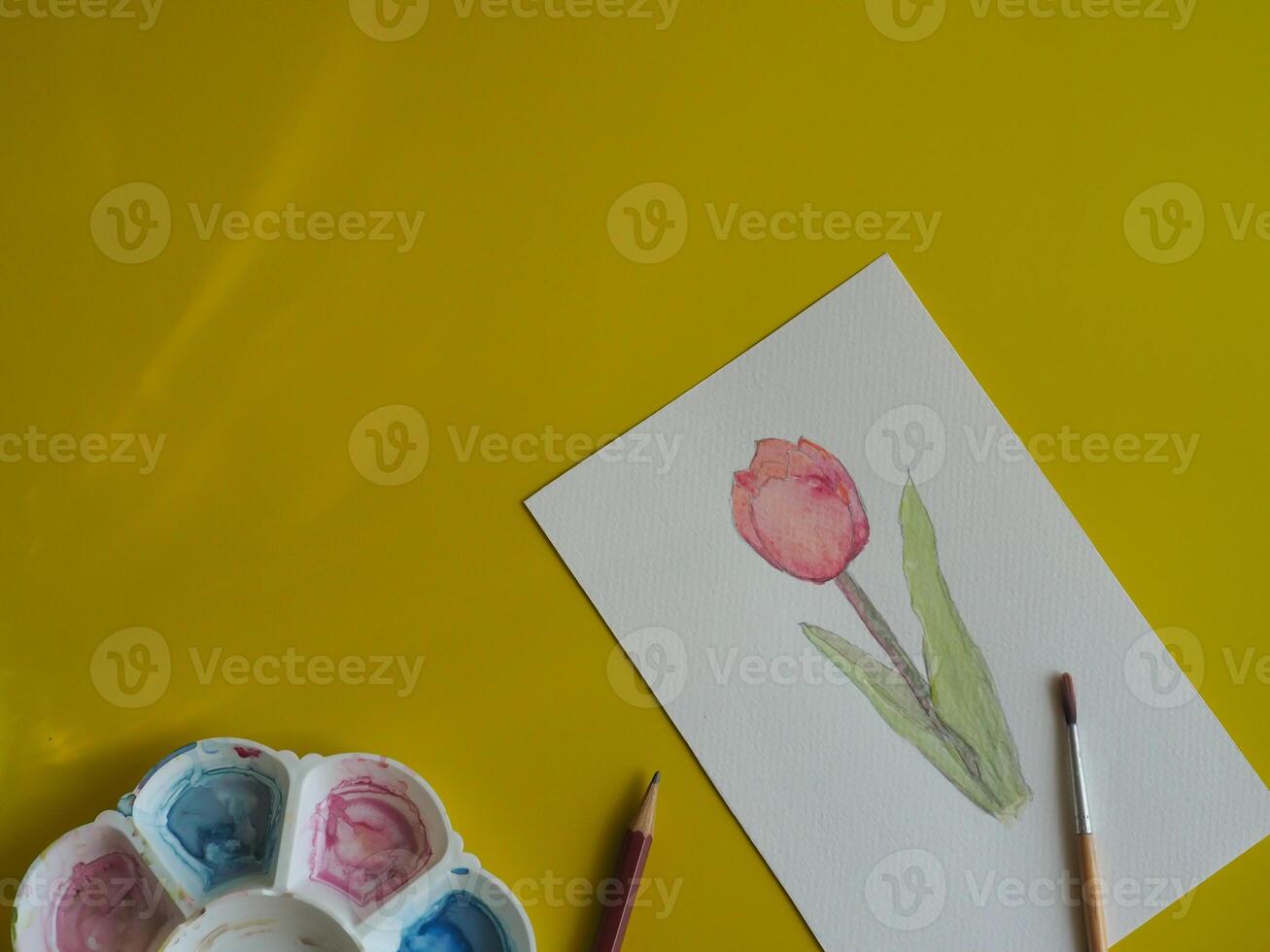 Drawing pastel minimalist pink tulips on paper with yellow background about art education photo