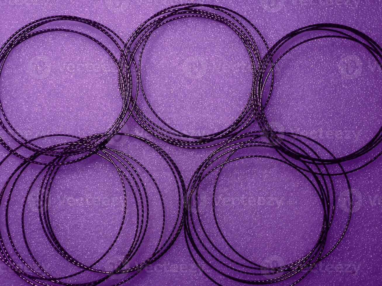 Dark purple circle wire pattern for abstract mysterious background. photo