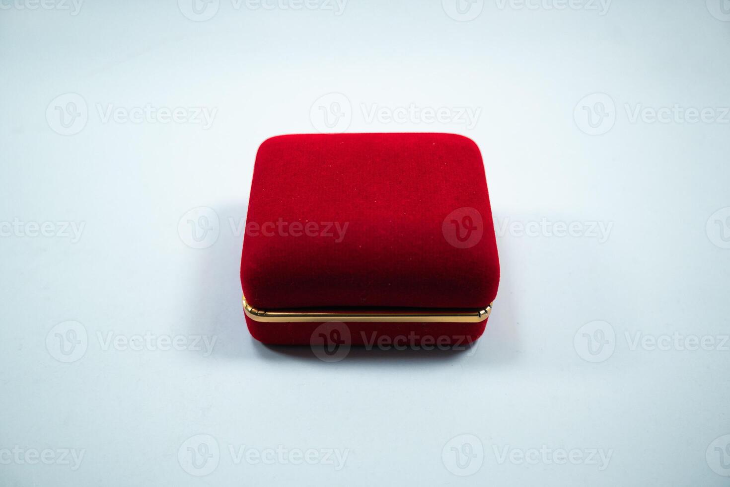 A stylish red ring holder with a sleek design, perfect for displaying your precious rings. Its vibrant red color enhances the elegance of any jewelry piece. Ideal for use in stores or personal collect photo