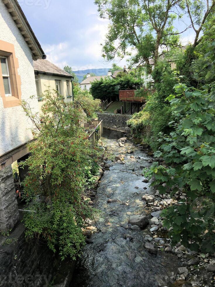A stream runs through a residential area photo