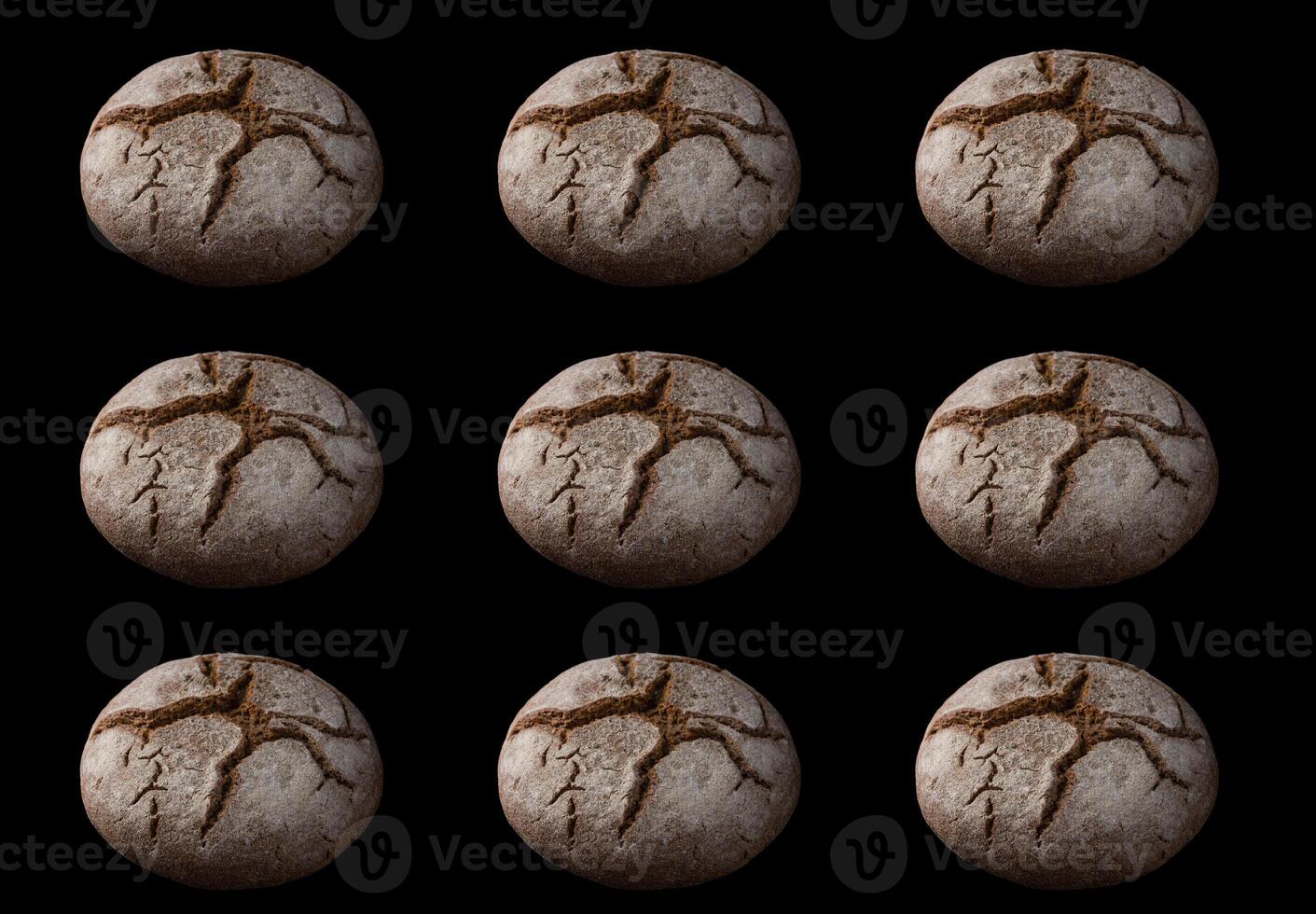 Rustic bread rolls in moody lighting photo