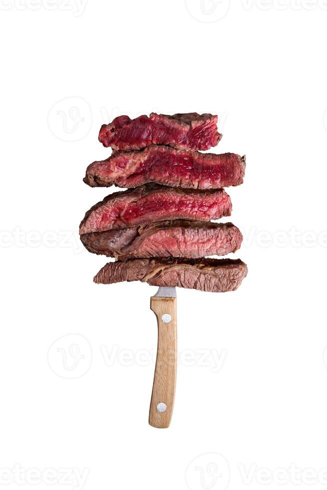 Juicy grilled beef steak on wooden spatula photo