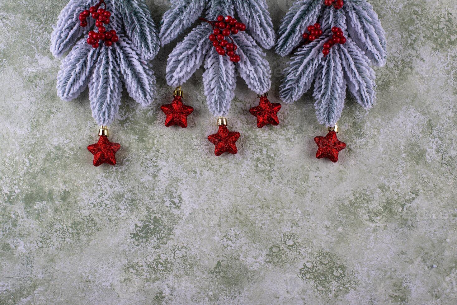 Festive Christmas background with fir tree and decoration photo