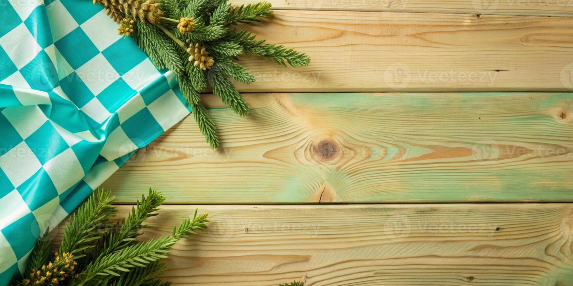 A Rustic Holiday Background Featuring Greenery and a Checkered Tablecloth Design photo
