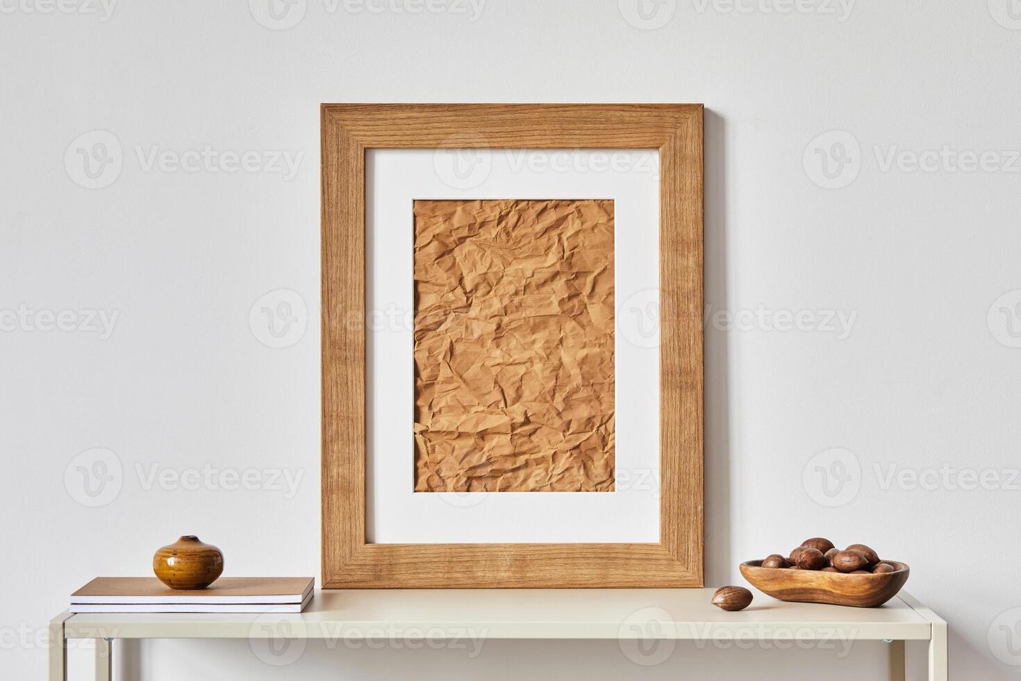 Elegant minimalist interior design with mock up poster frame, metal shelf and minimalistic accessories and vase. Copy space. Template. photo