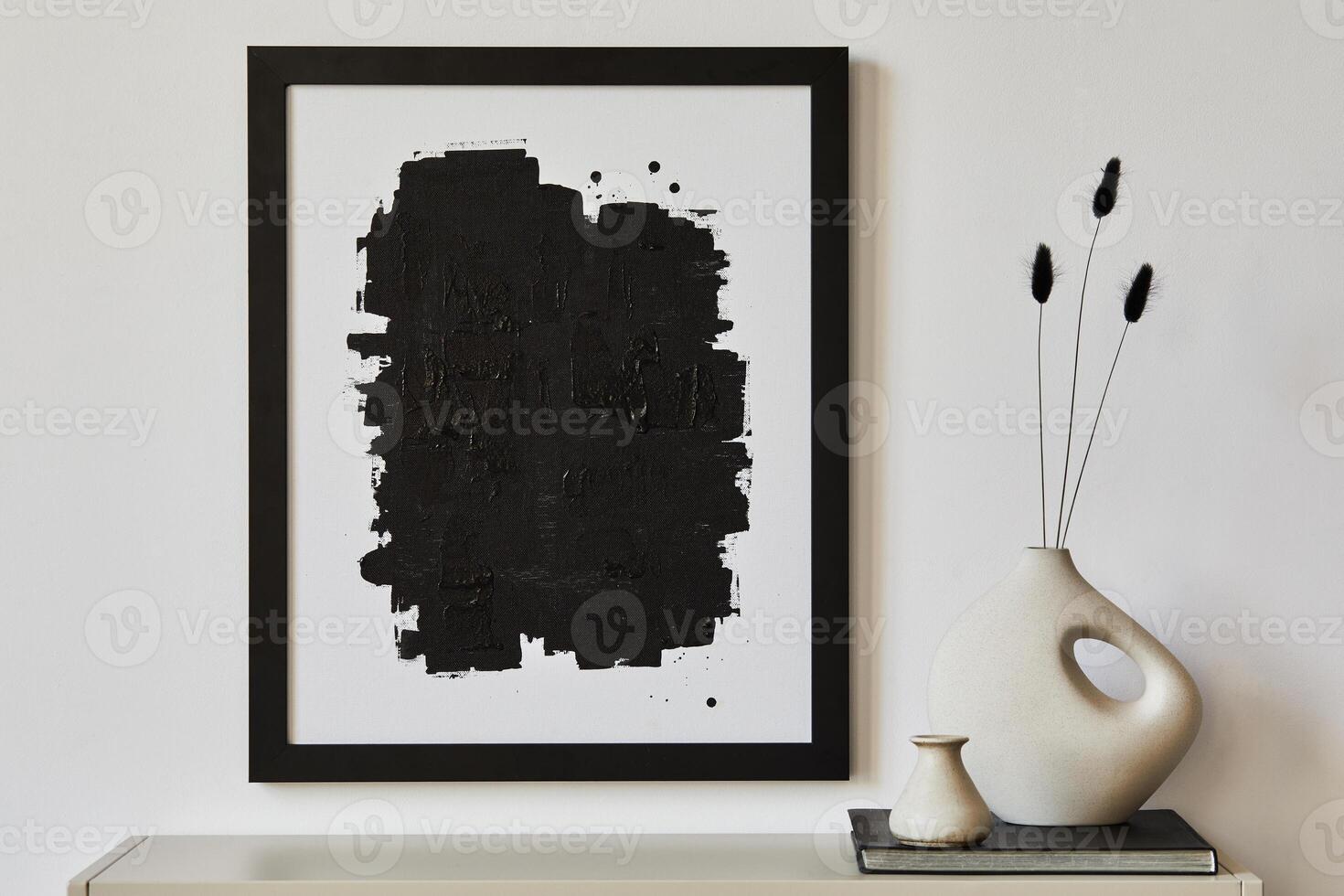 Minimalist composition of living room interior with black mock up poster frame, beige commode, vase and white personal accessories. Copy space. Template. photo