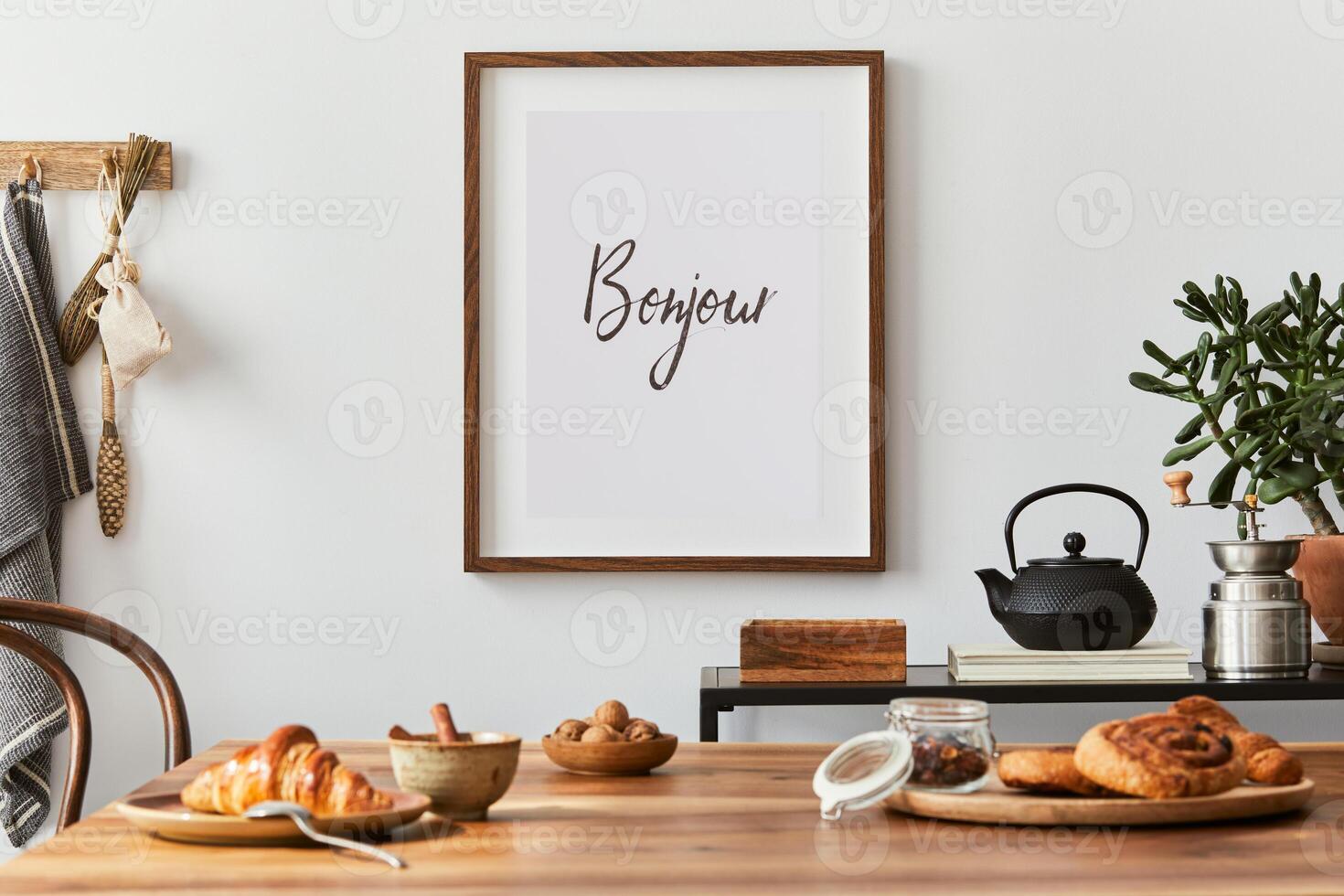 Creative and modern dining room interior design with mock up poster frame, family dining table, black console and retro inspired personal accessories. Template. Autumn vibes. photo