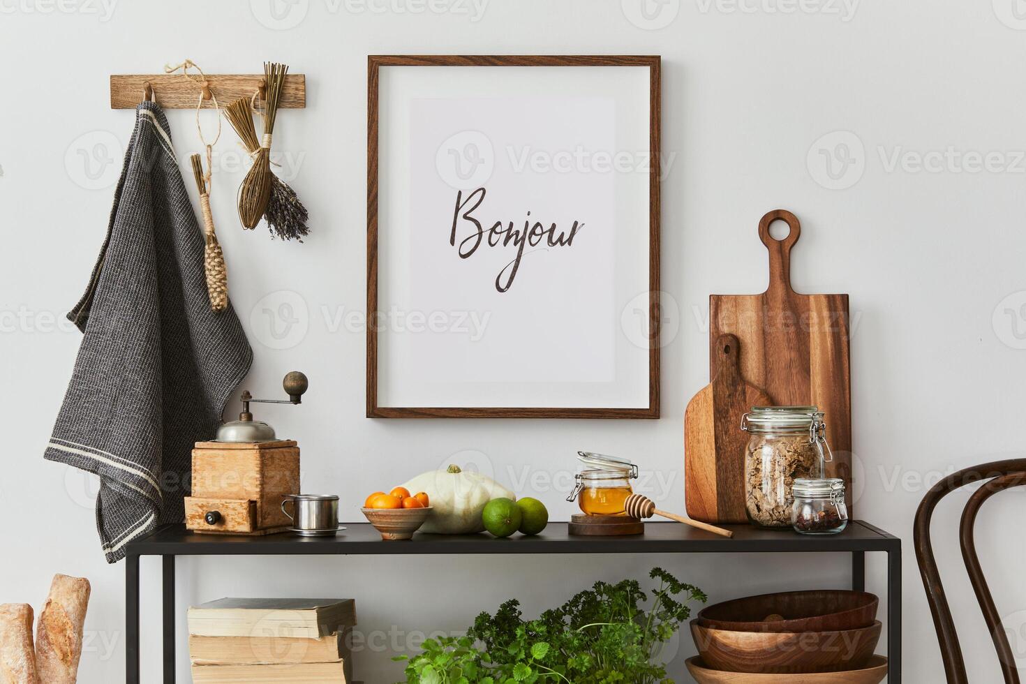 Stylish composition of modern kitchen interior design with mock up poster frame, black console and retro kitchen accessories. Autumn vibes. photo