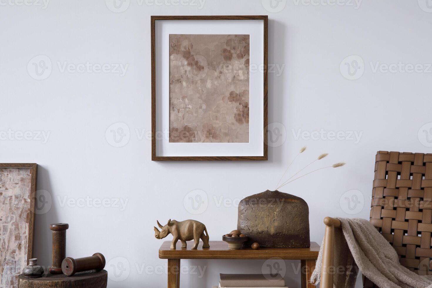 Elegant comosition of masculine room decor with wooden bench, mockup painting and vintage accessories. Home staging. Template. Copy space. photo