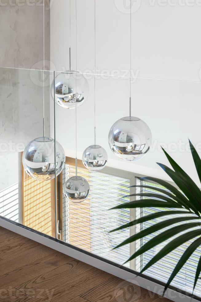 Creartive close up on stylish modern chandelier in minimalistic glamour interior design. Template. photo