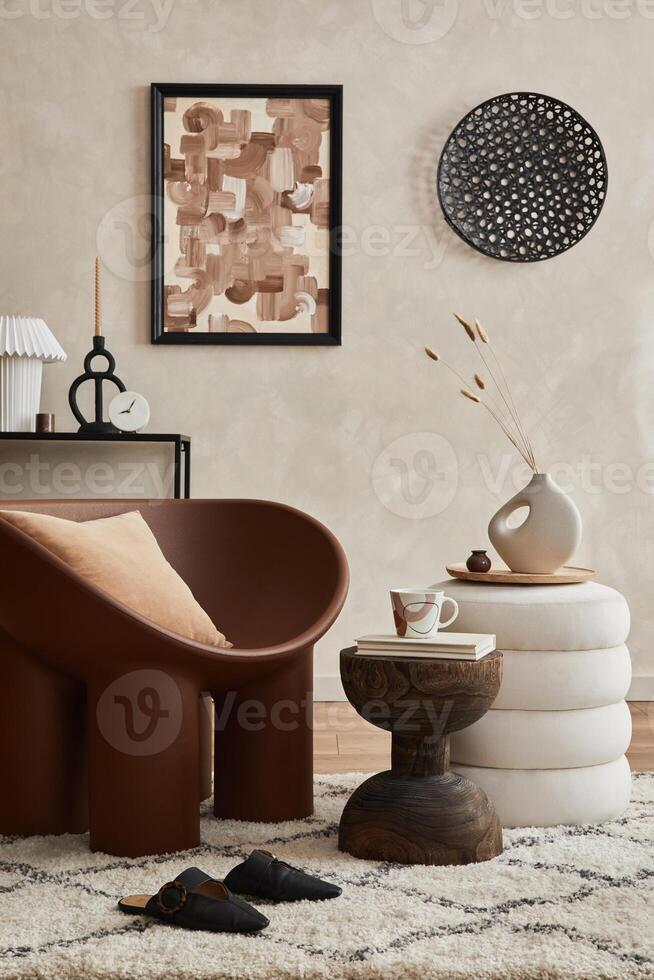 Elegant living room interior composition with creative armchair, coffee table, mock up poster frame and creative design personal accessories. Copy space. Template. photo