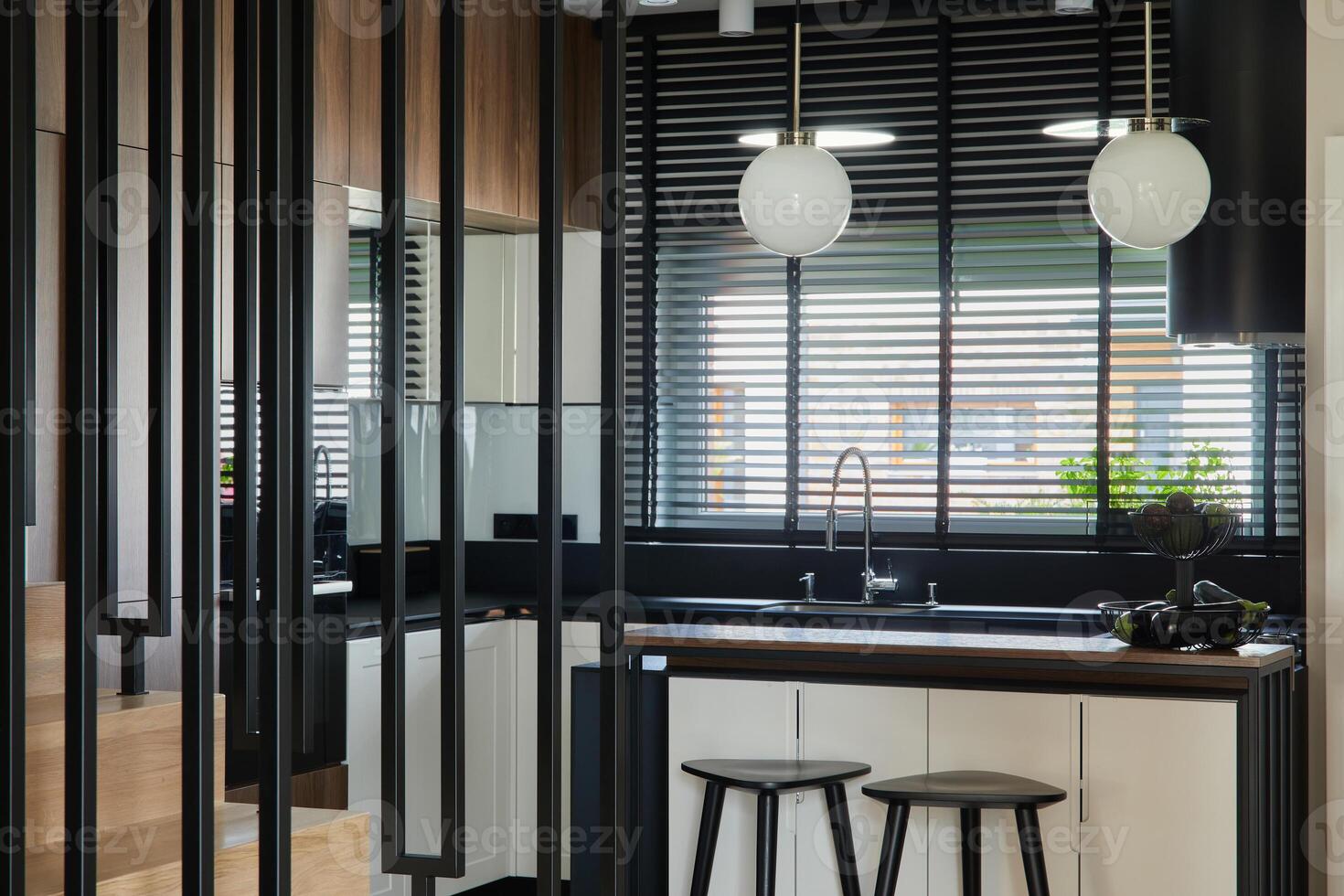 Modern composition of kitchen interior design with biuld-in kitchen, kitchen island and bar stools. Geometric forms and shapes. Details. Template. photo