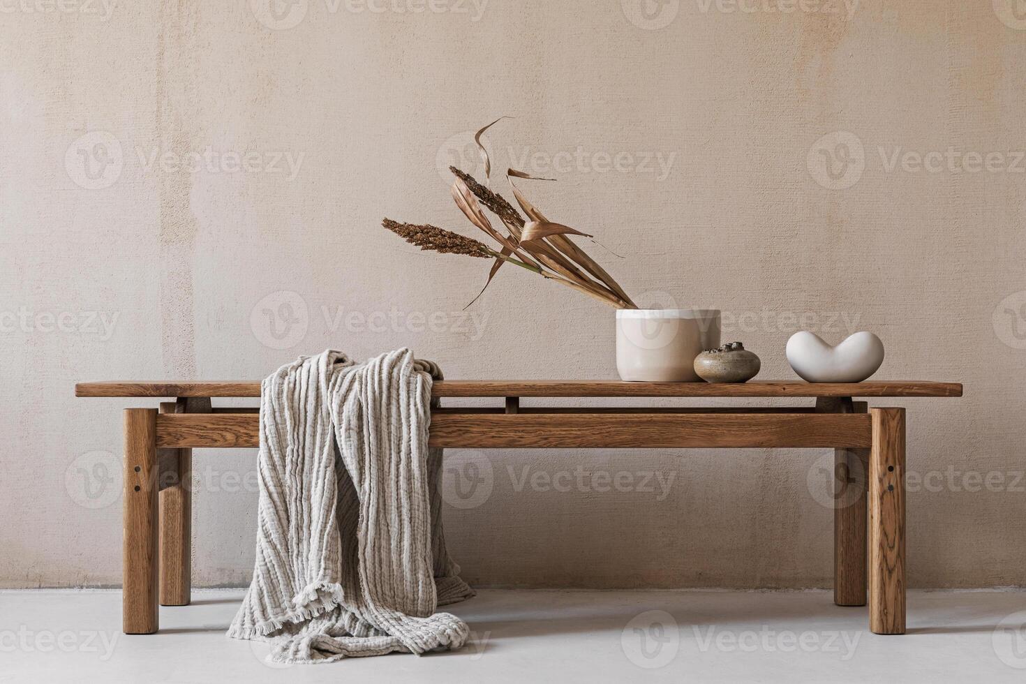 Creative composition with elegant wooden bench. Beautiful decorations and accessories. Modern home interior design. Retro inspiration. Copy space. Structure wall. Template. photo