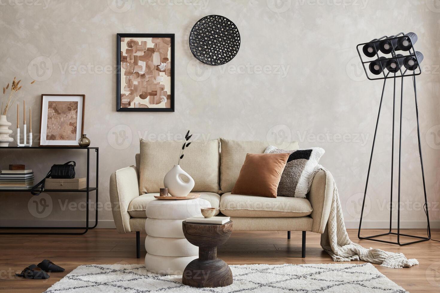 Modern minimalistic living room interior design with sofa, console, mock up poster frame, lamp and stylish personal accessories. Copy space. Template. photo