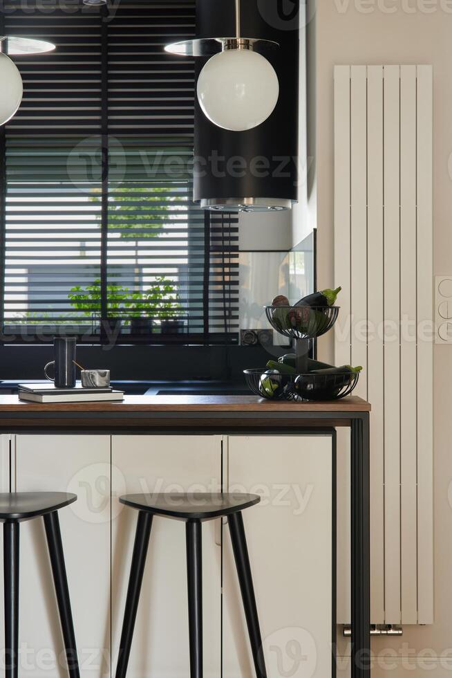 Modern kitchen interior design with biuld-in kitchen, kitchen island and bar stools. Geometric forms and shapes. Details. Template. photo