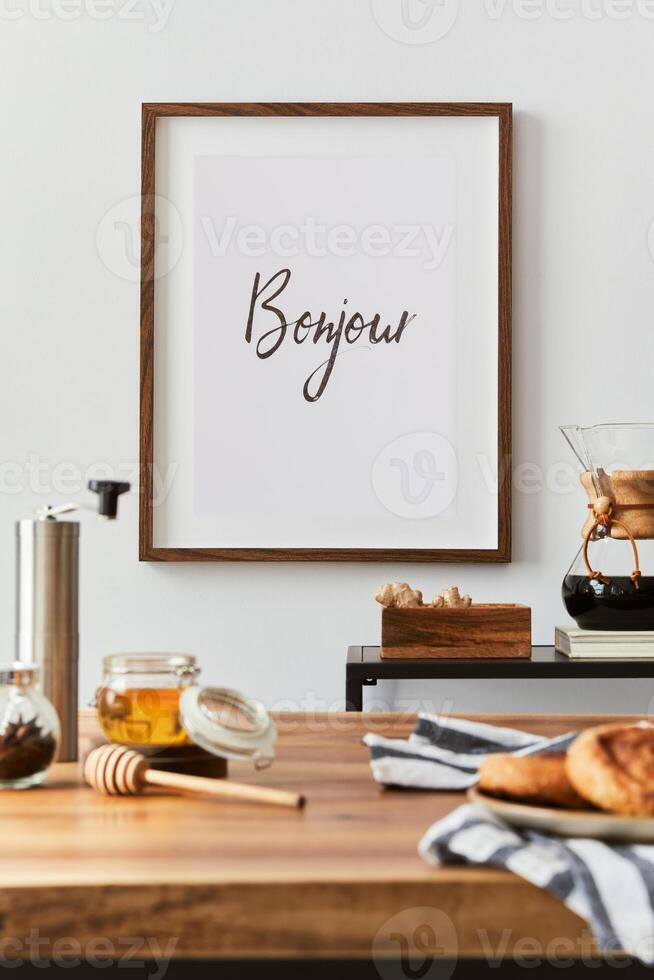 Creative minimalistic dining room interior design with mock up poster frame, dining table and cozy personal accessories. Copy space. Template. Autumn vibes. photo
