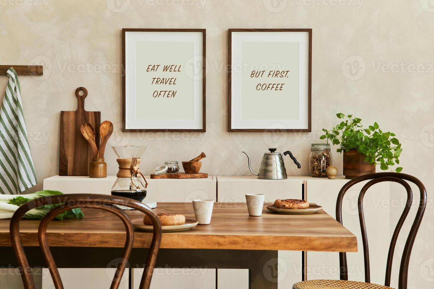 Elegant composition of stylish dining room intrerior with mock up poster frames, beige sideboard, family dining table, plants and vintage personal accessories. Copy space Autumn vibes. photo