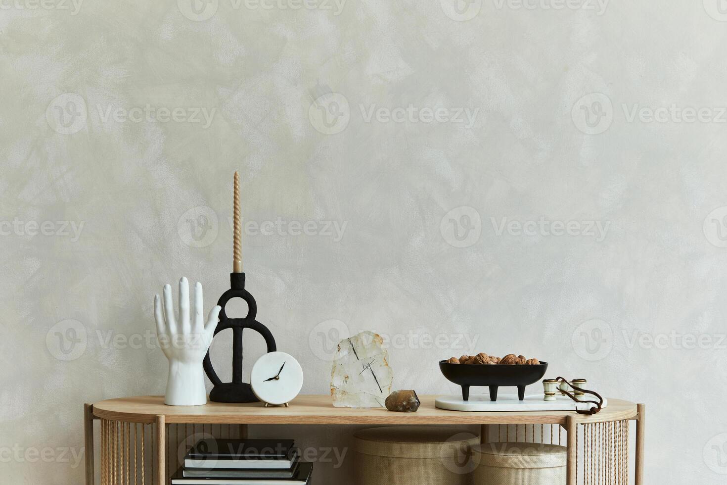 Stylish composition of personal accessories on the console in the living room. Sculpture, candlectick, minerals and tray. Template. photo