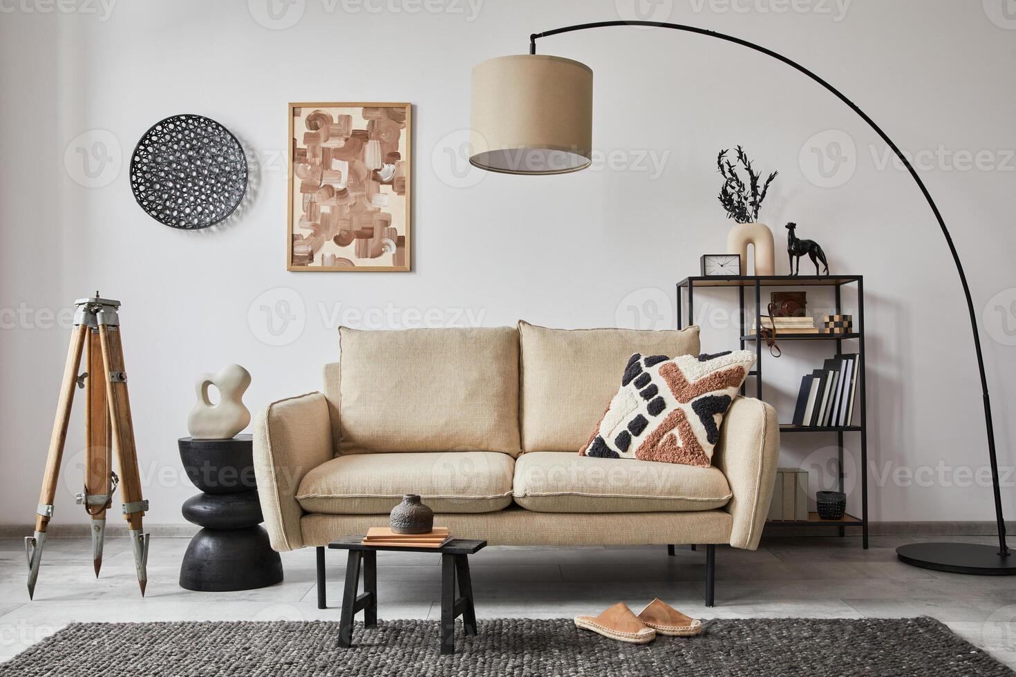 Creative composition of modern living room interior with mock up poster frame, beige sofa, side table and stylish small personal accessories on metal shelf. Copy space. Template. photo
