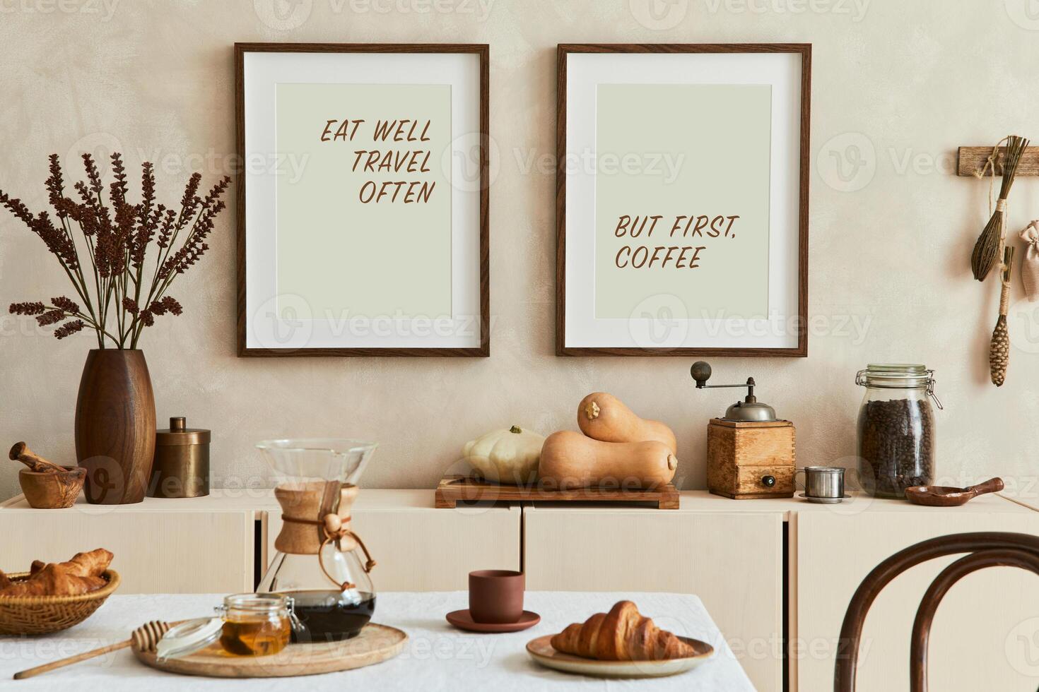 Creative and modern dining room interior design with poster frames, beige sideboard, family dining table and retro inspired personal accessories. Copy space. Template. Autumn vibes. photo