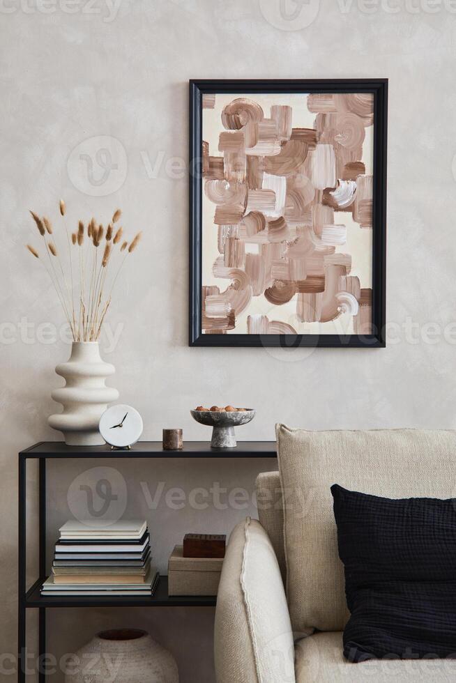 Elegant interior of living room with beige sofa, black console, mock up poster frame and stylish home decor. Copy space. Template. photo