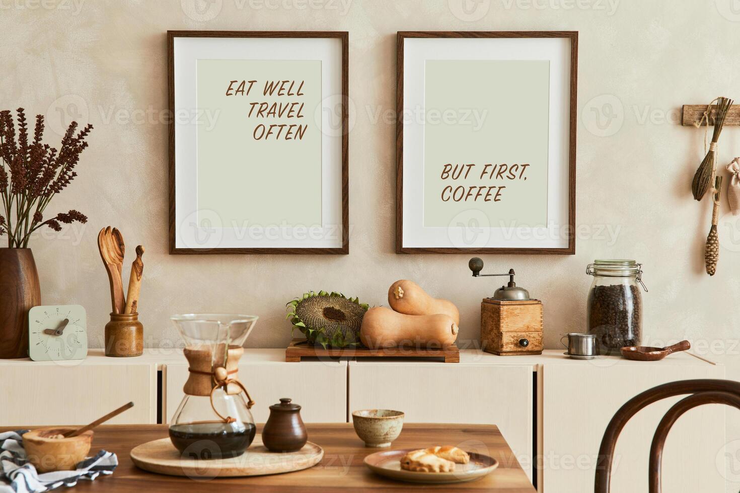 Elegant composition of creative dining room intrerior with mock up poster frames, beige sideboard, family dining table, vegetables and vintage personal accessories. Template. Autumn vibes. photo