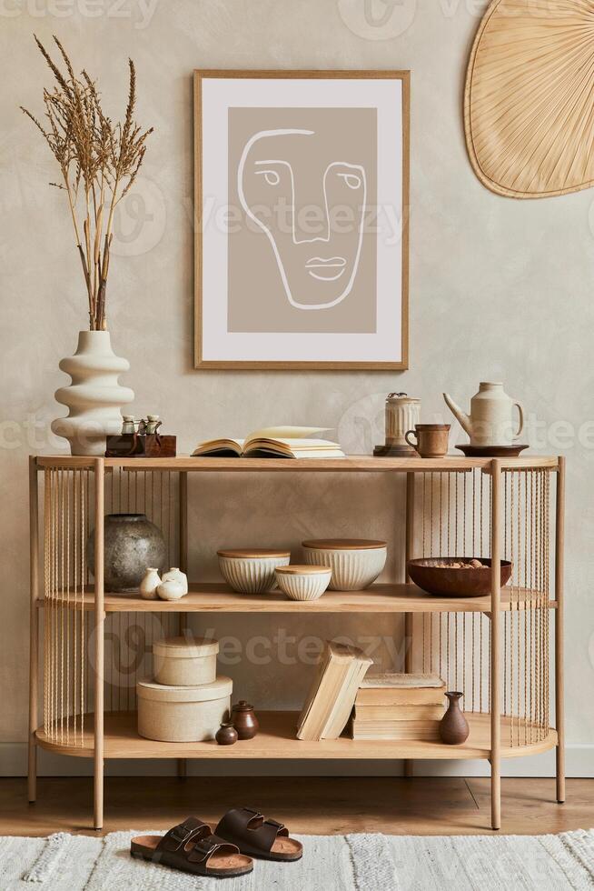 Stylish composition of living room interior design with mock up poster frame, console and stylish and elegant personal accessories as books, vases and boxes. Copy space. Template. photo
