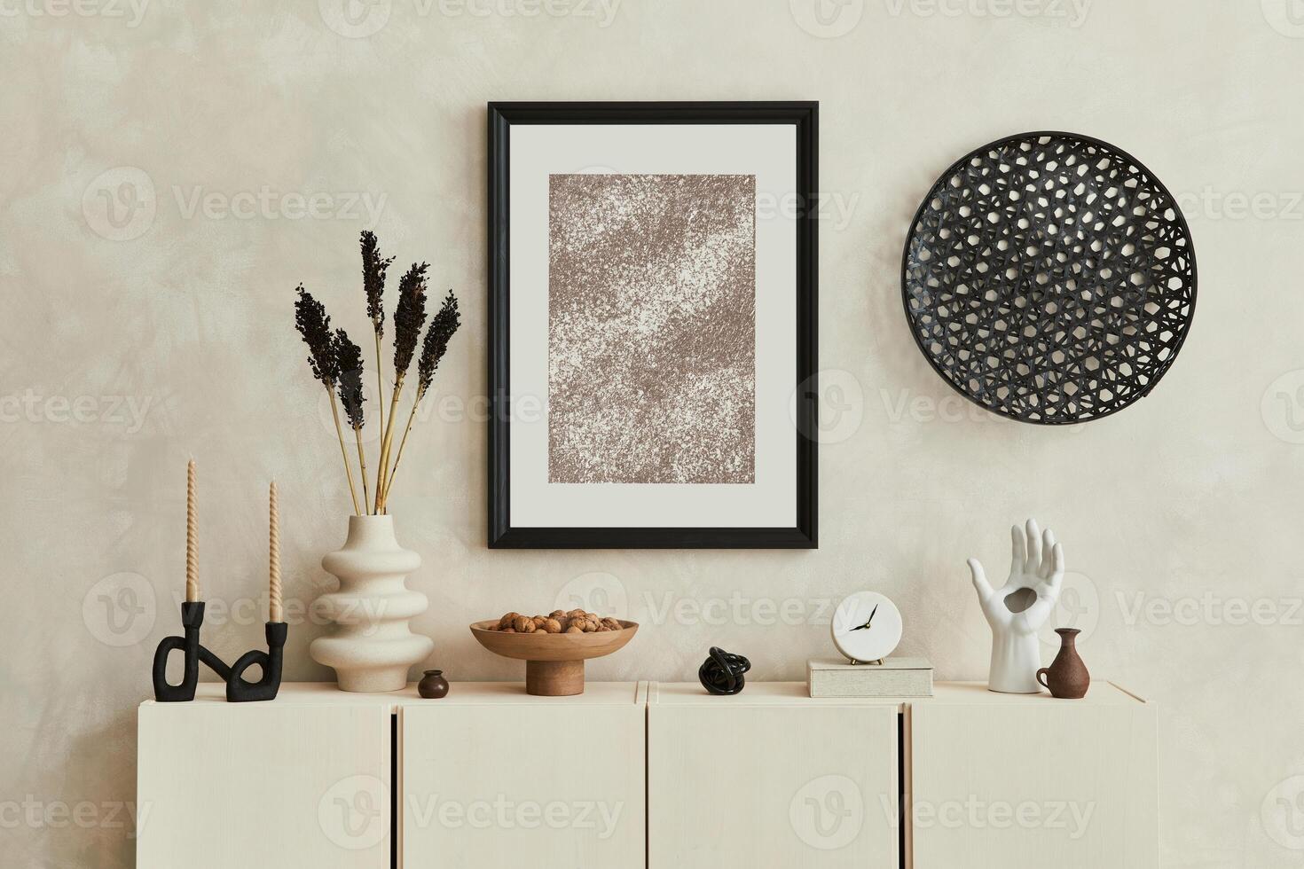 Stylish composition of living room intrerior with mock up poster frame, beige sideboard and personal accessories. Copy space. Template. photo