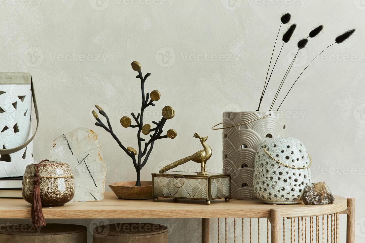 Beautiful living room interior design with candlectick, vases, mineral and personal accessories on the wooden console Copy space photo