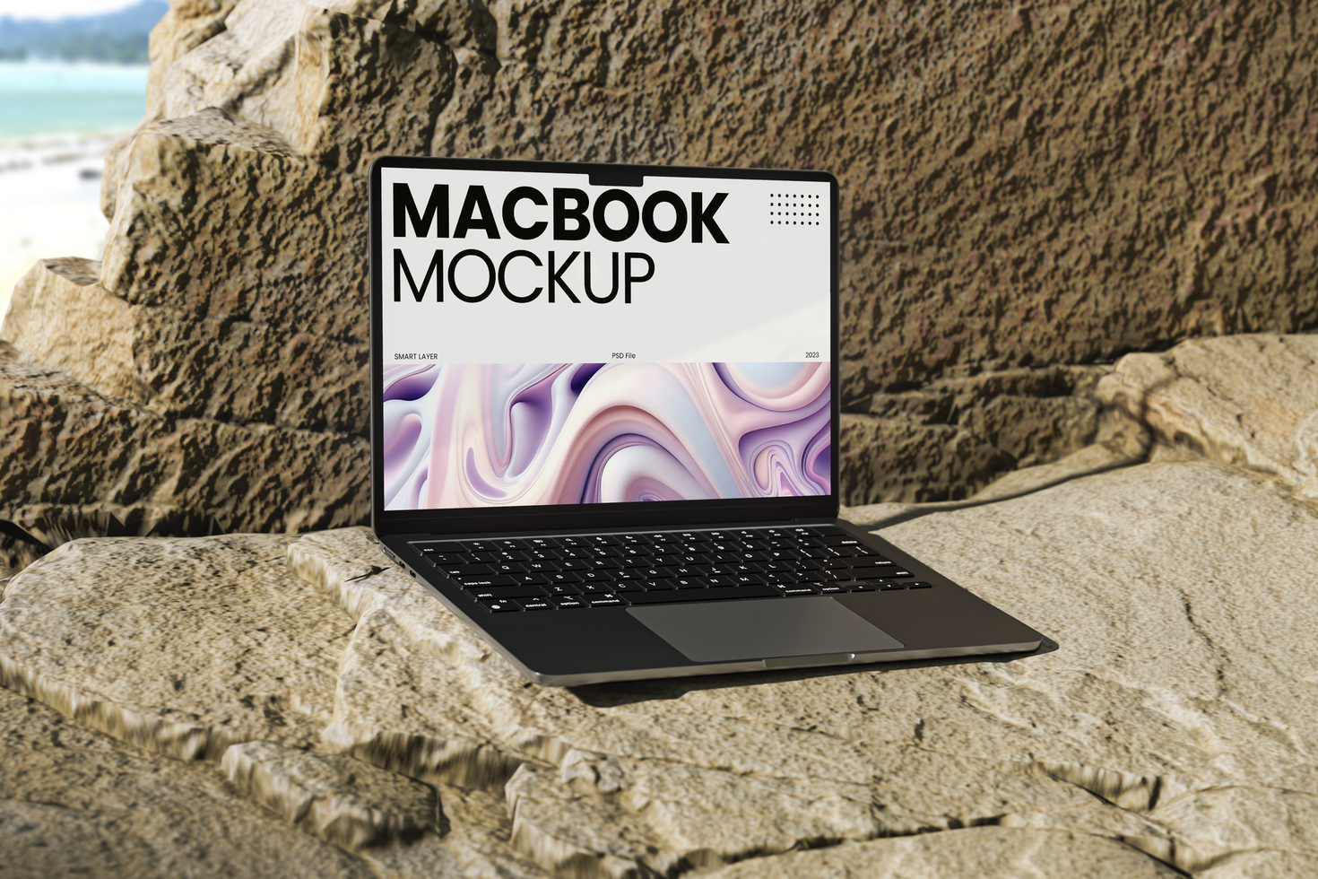 Laptop Device Mockup sitting above stone psd