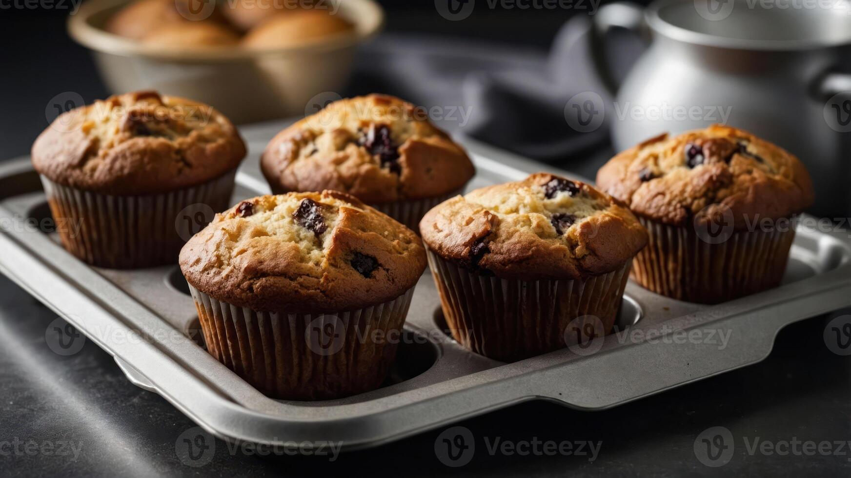 A tray of freshly baked muffins, showcasing a delicious treat ready for enjoyment. photo