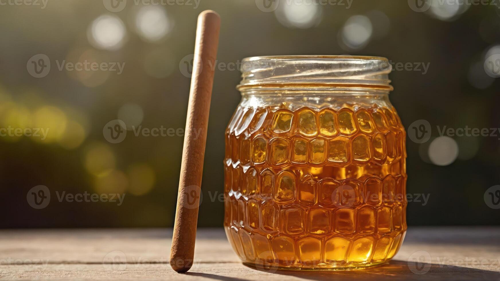 A jar of honey with a wooden dipper, set against a soft, natural background. photo