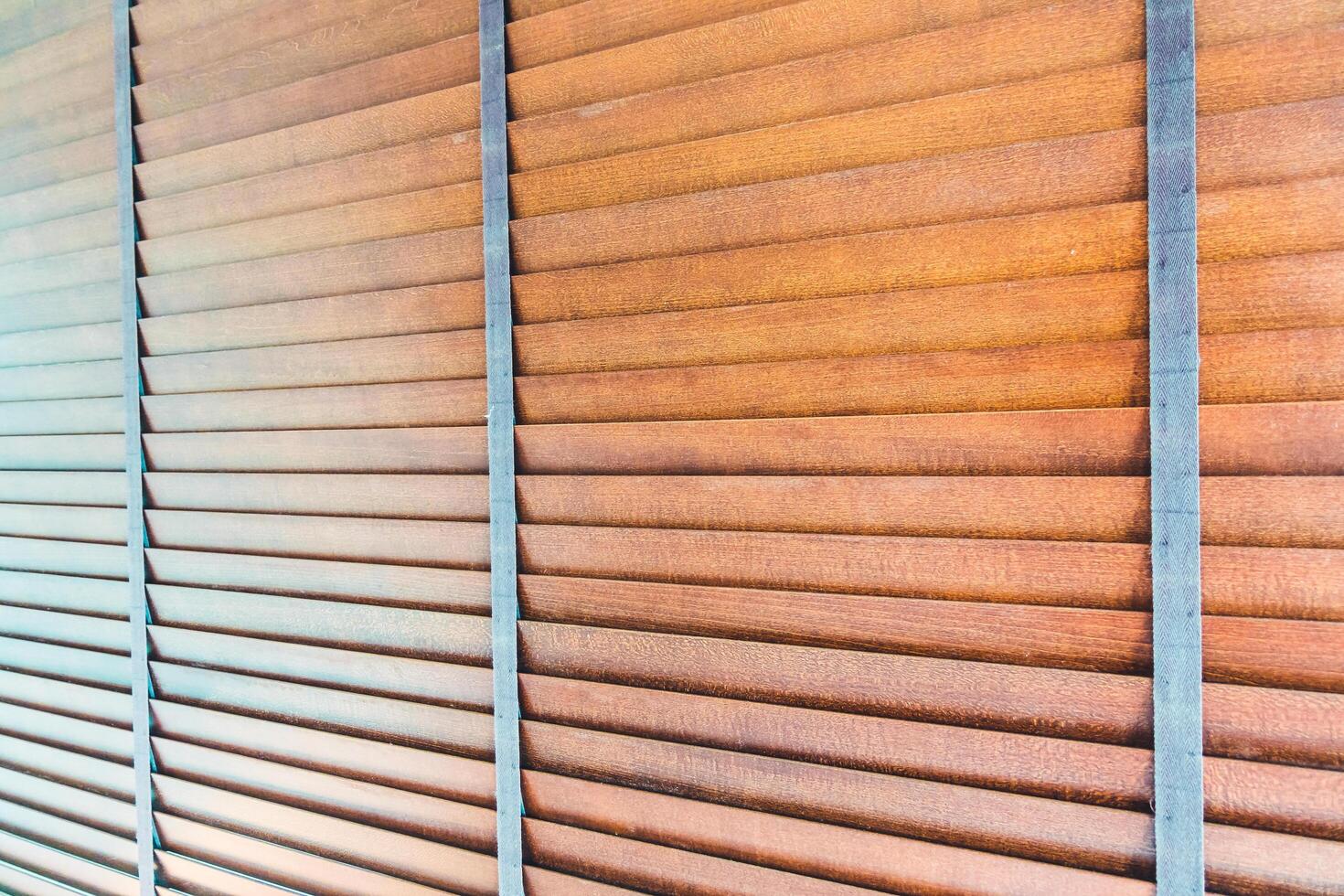 Wooden blinds on a wall photo
