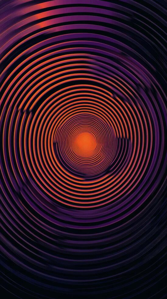 Swirling orange and purple concentric circles creating an abstract pattern at night photo