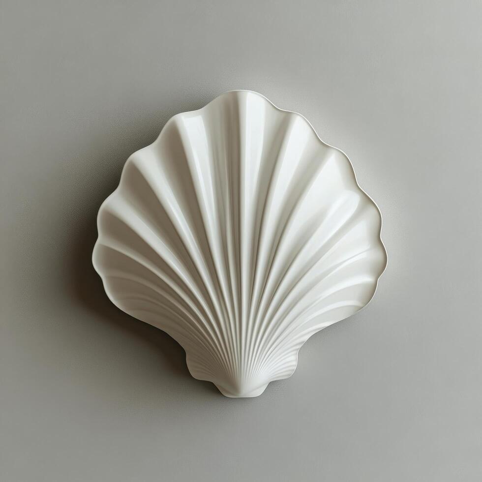 Decorative white shell relief wall art inspired by coastal themes in modern interior design photo