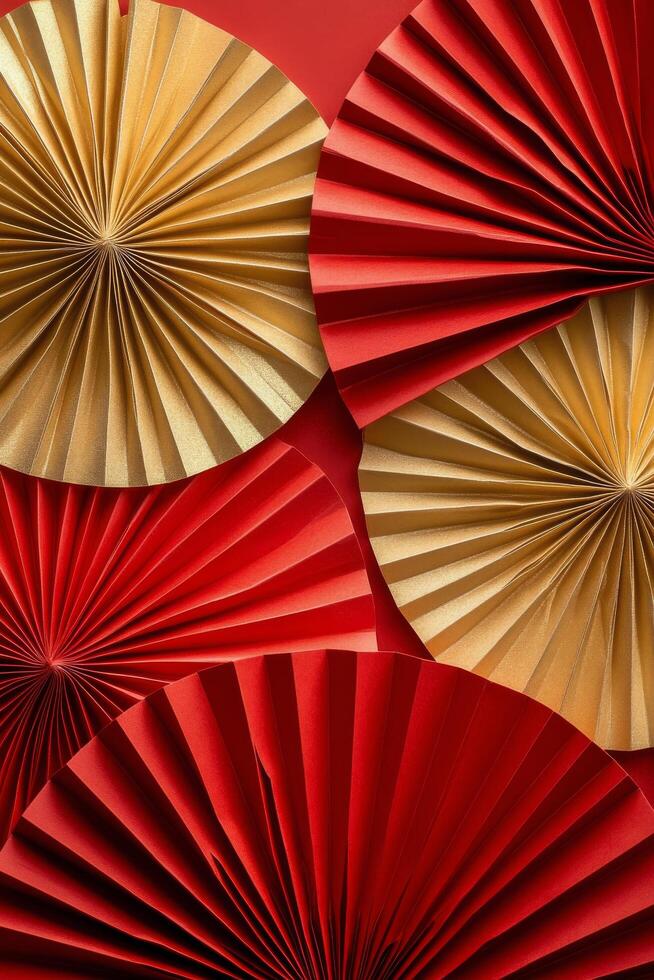 Decorative fans in red and gold arranged in a beautiful display for a festive event photo