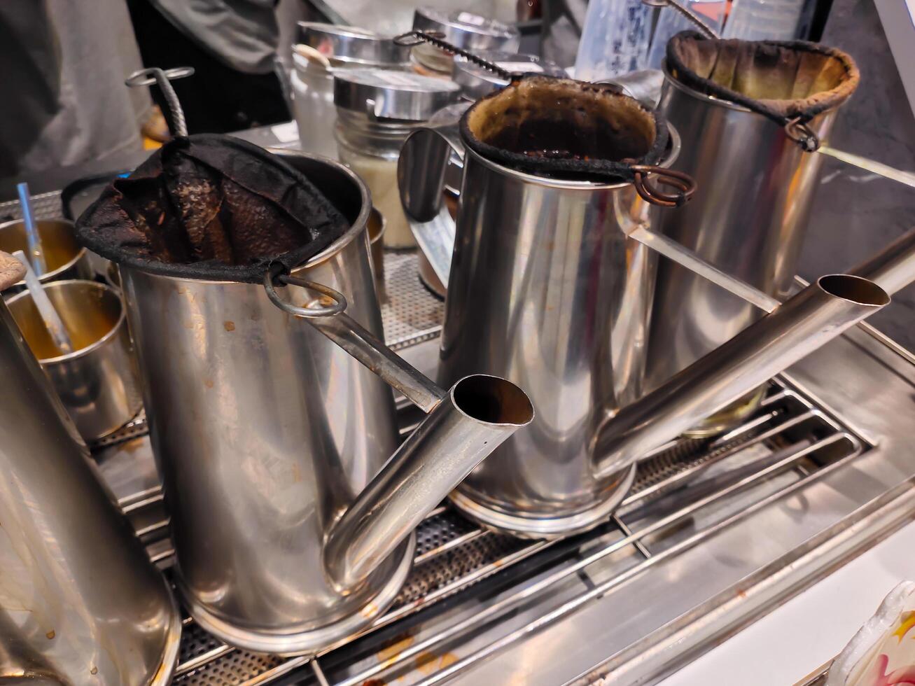 Stainless steel tea pot for making various types of drinks from tea and coffee photo