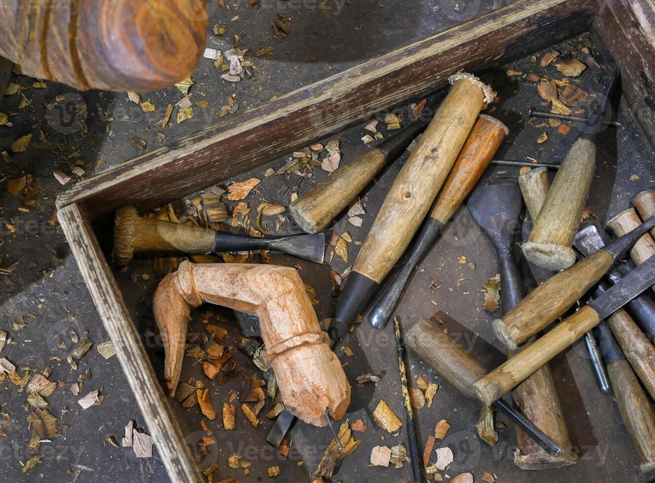 carpentry tools on a worksite, wood carving tools photo