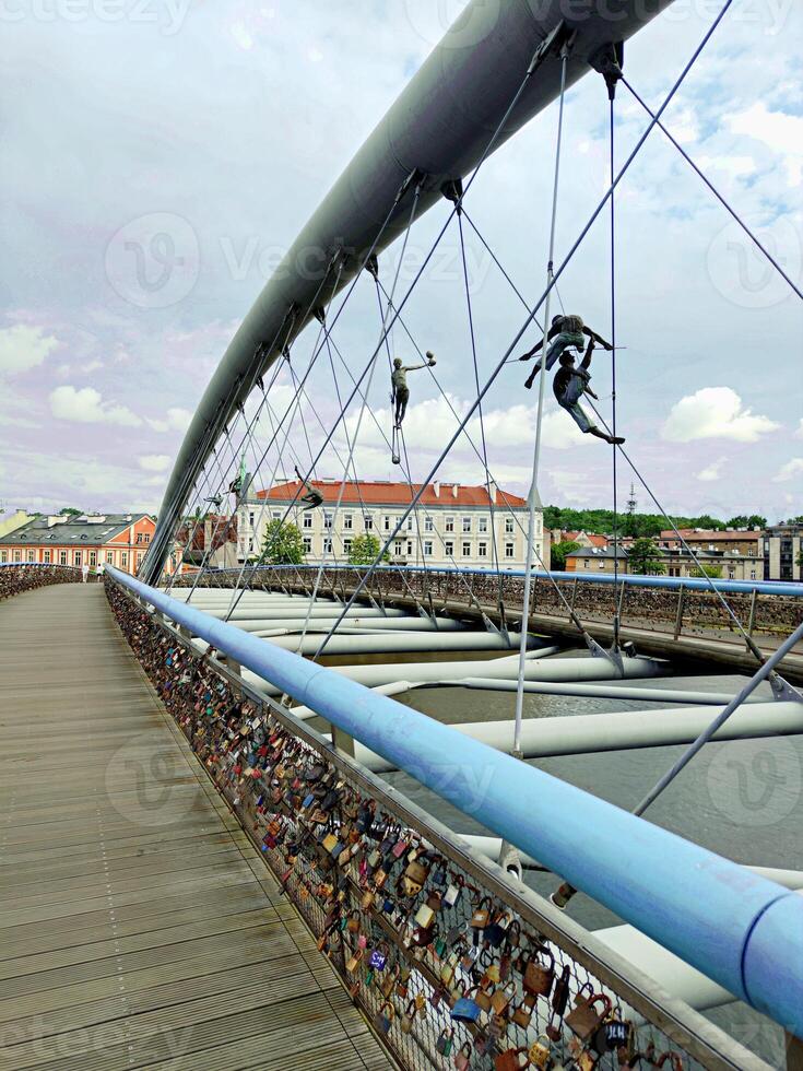 A bridge with a bunch of locks on it photo
