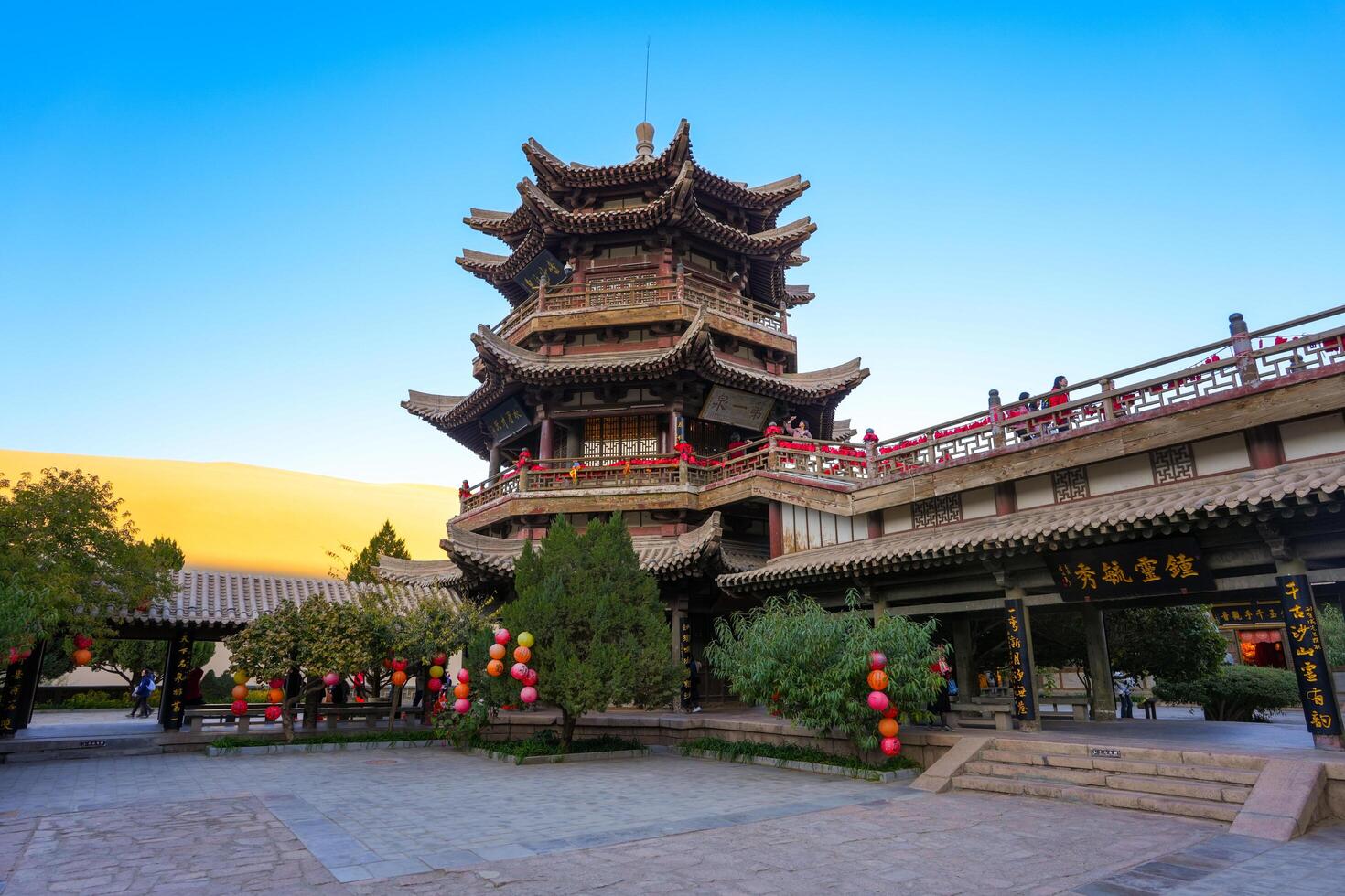 Dunhuang,China-OCT 21, 2024- Crescent Lake, called as Yueyaquan, is a crescent shaped lake in the oasis, located in Dunhuang city, China photo