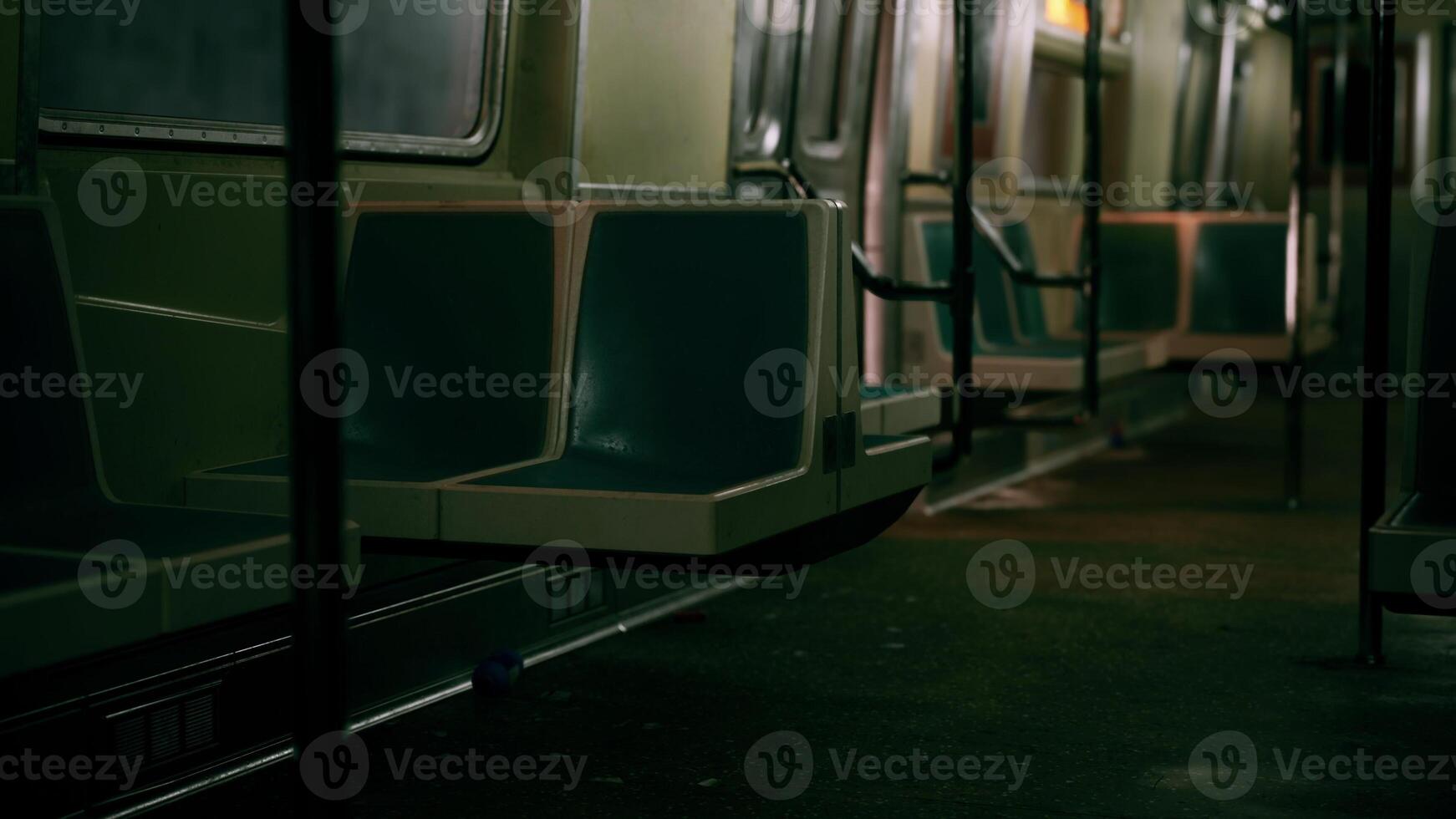 Empty Seats in Dark Subway Car photo