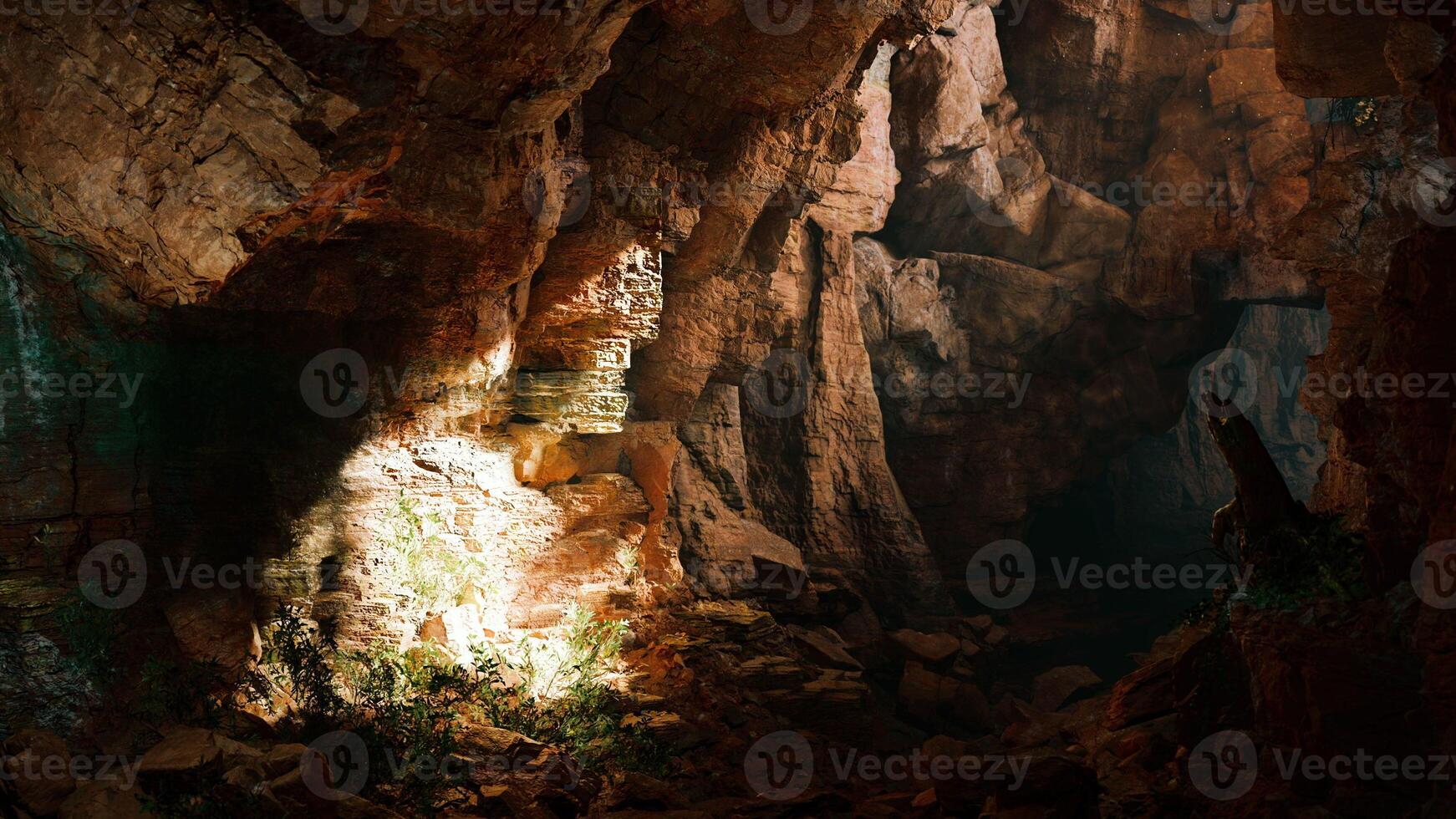 A mysterious cave illuminated by a beam of light photo