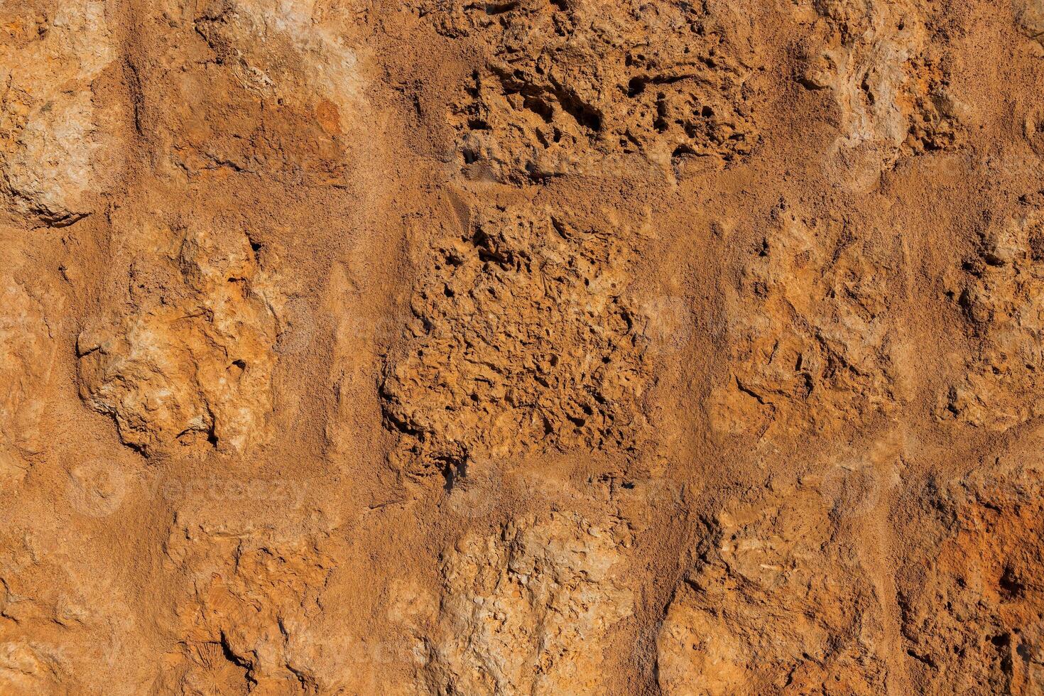 Ancient wall made of stones in the Egyptian desert, Sinai Peninsula. Background photo
